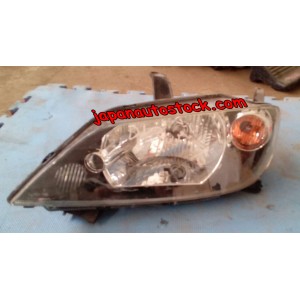 Передня фара Mazda 2, 2004